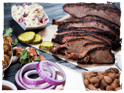 Brisket, Cole slaw, beans, pickles and onions