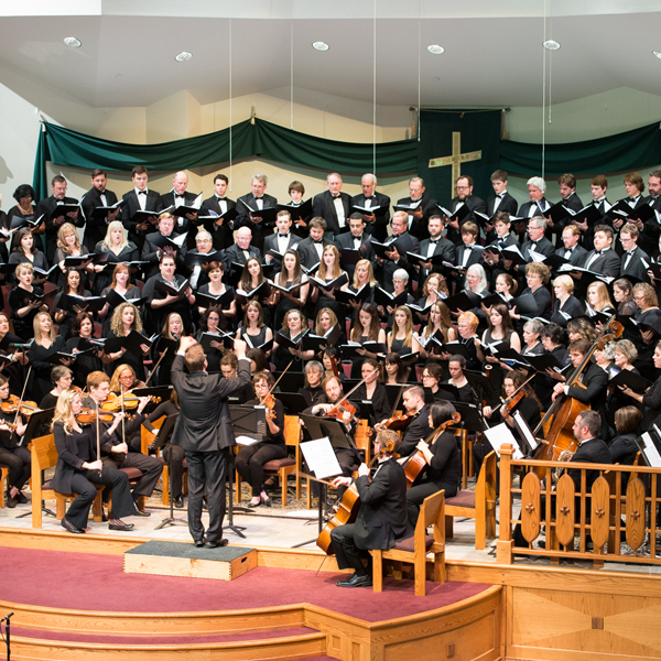Round Rock Community Choir singing in a church