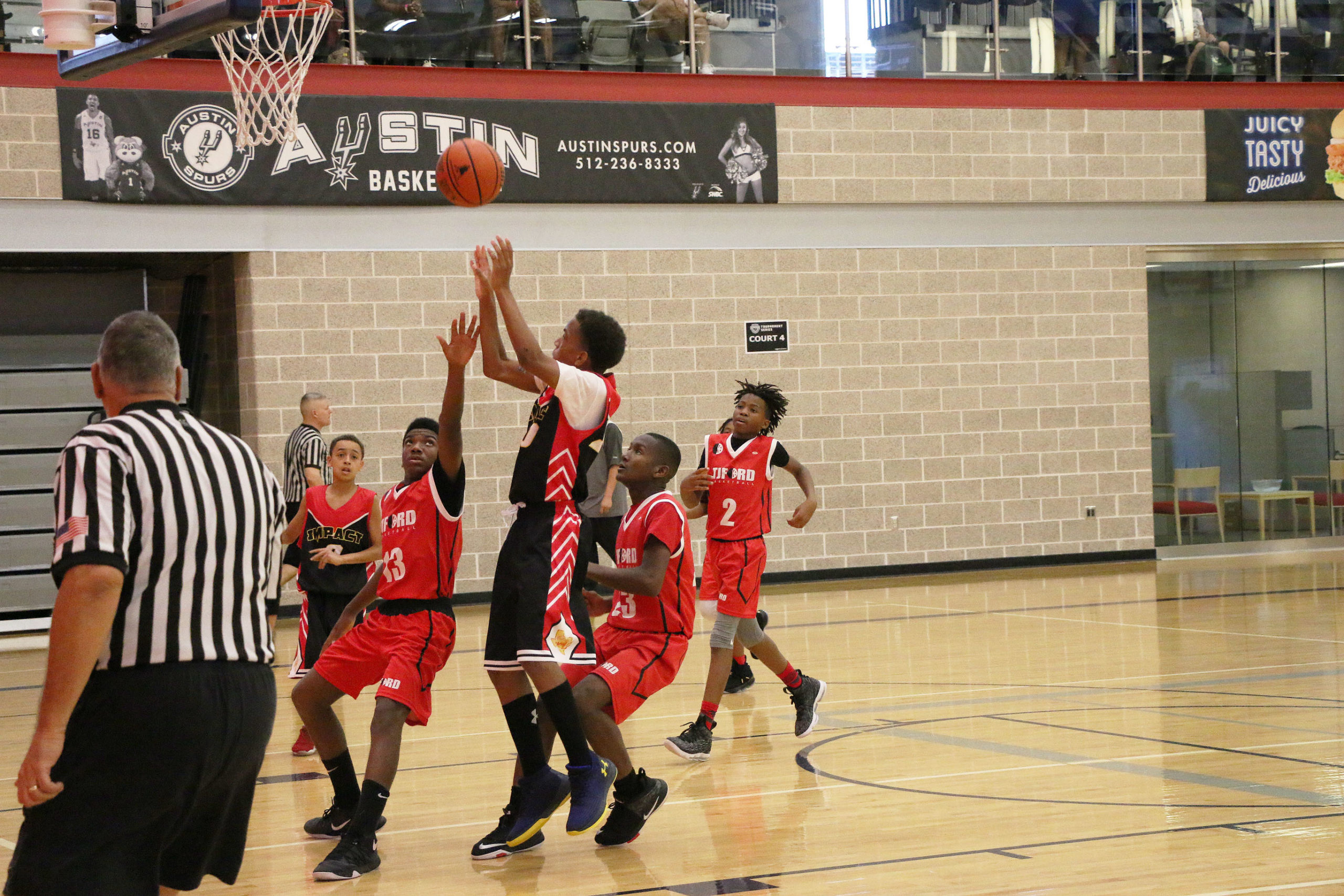 Boys' basketball teams playing at the Round Rock Sports Center
