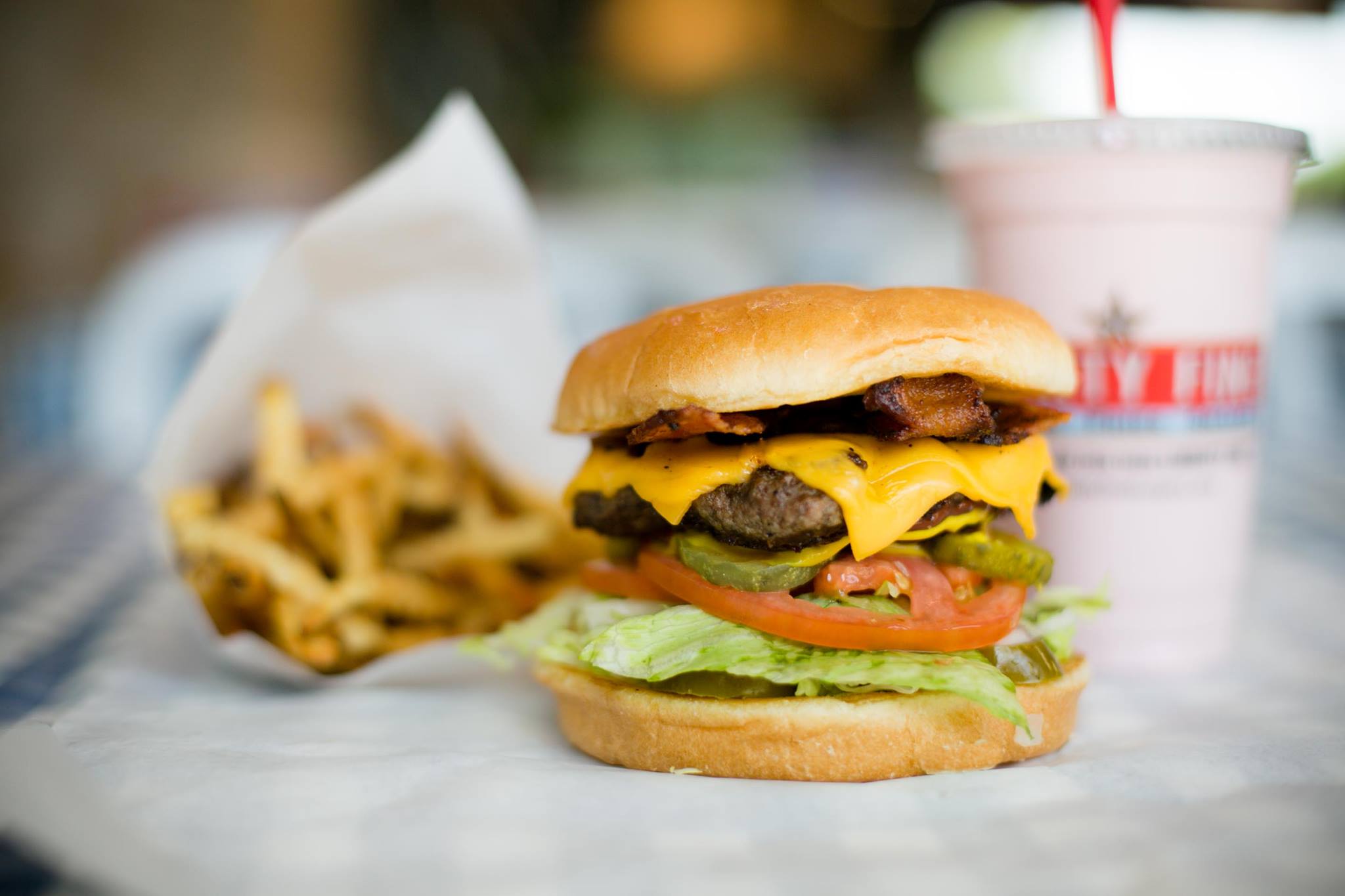 Photo of a hamburger and fries from Mighty Fine in Round Rock Texas