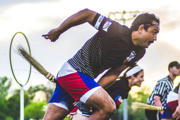 people playing Quidditch on a field