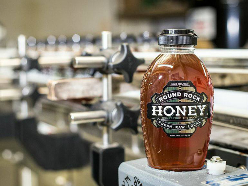 Round Rock Honey Bottle on production line