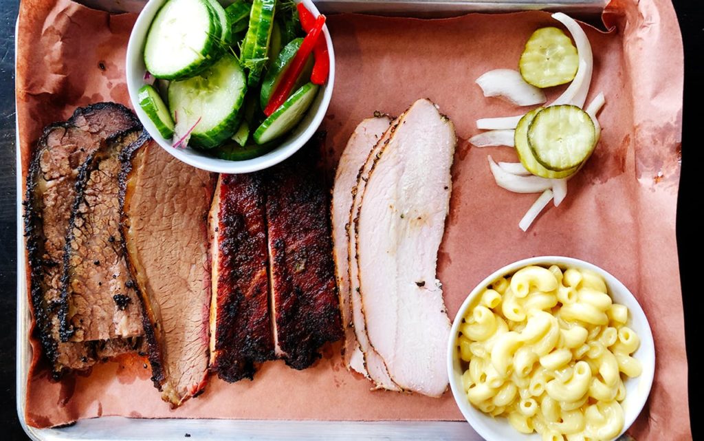 A tray of meats and sides at Liberty Barbecue in Round Rock Texas