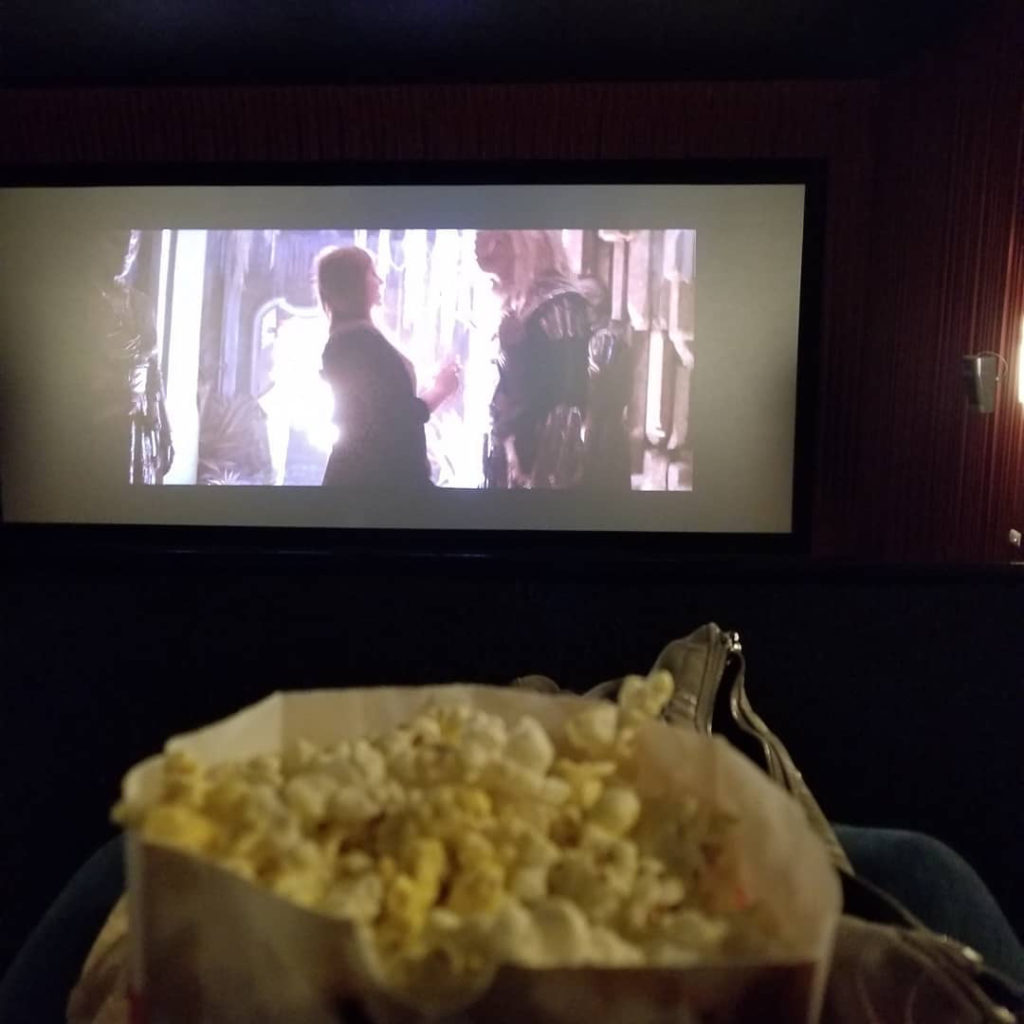 Movie theater with popcorn. 