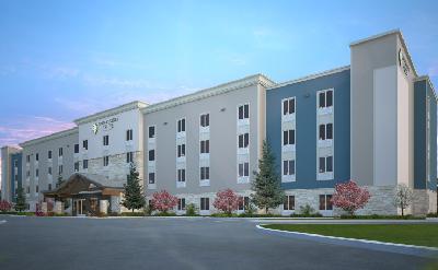 Front exterior view of WoodSpring Suites hotel
