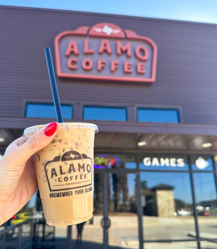 Photo of Alamo Coffee with photo of person holding a cup of coffee. 