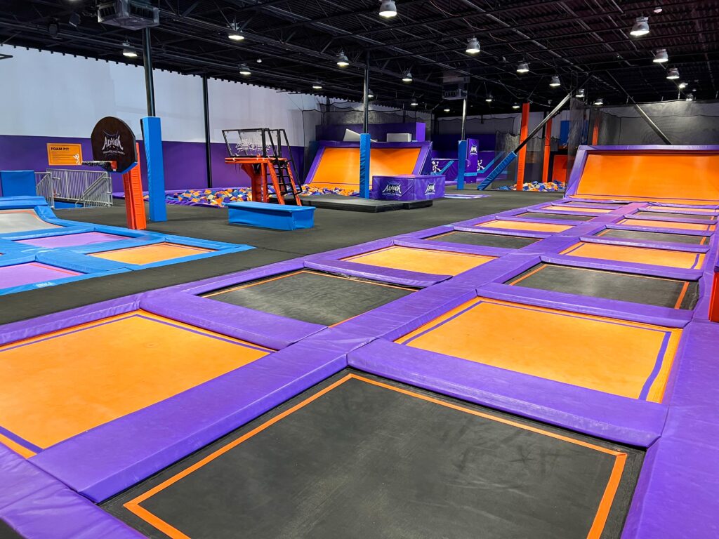 Photo of Altitude Trampoline park and colored trampolines. 