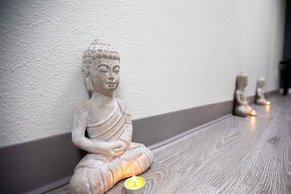 Buddha statue along wall