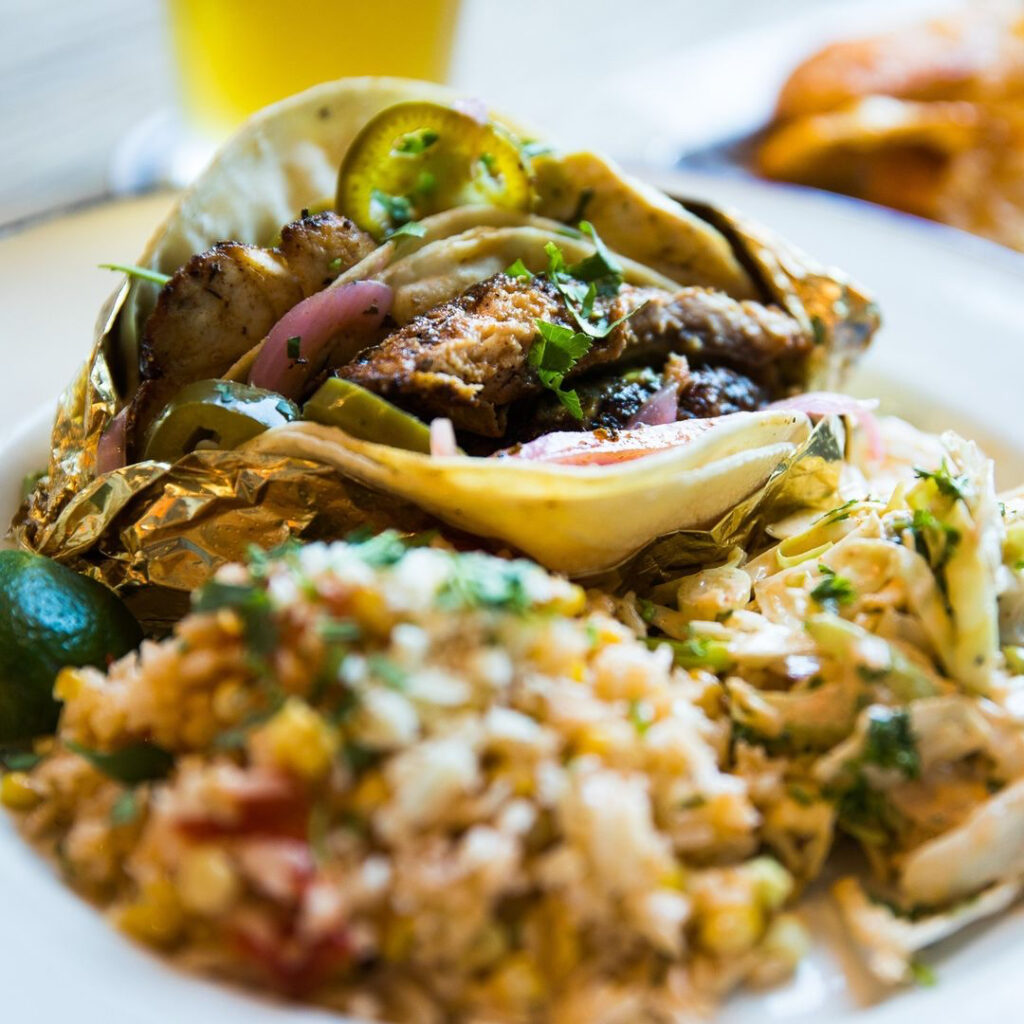 Photo of tacos and rice. 