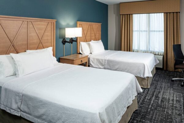 Guest room with two beds at Homewood Suites