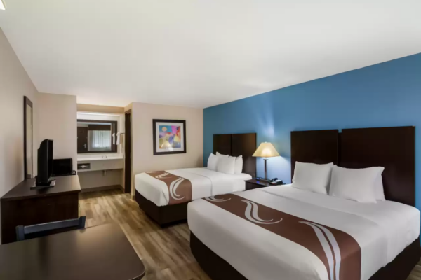 Guest room with two beds at Quality Inn and Suites hotel
