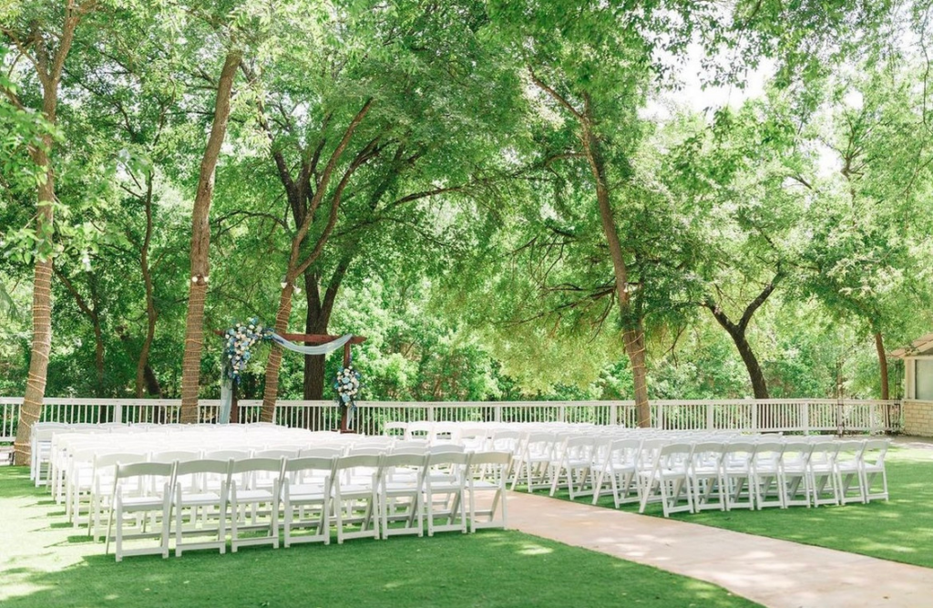 Exterior view of grounds with chairs setup for a wedding