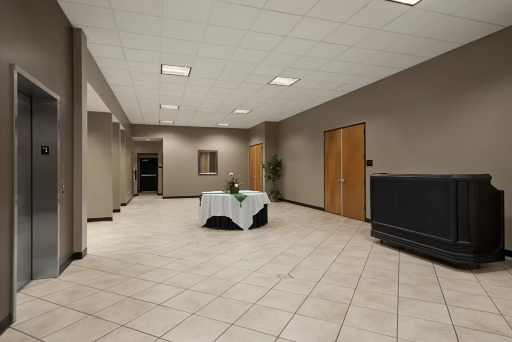 Interior view of conference center lobby area with elevator