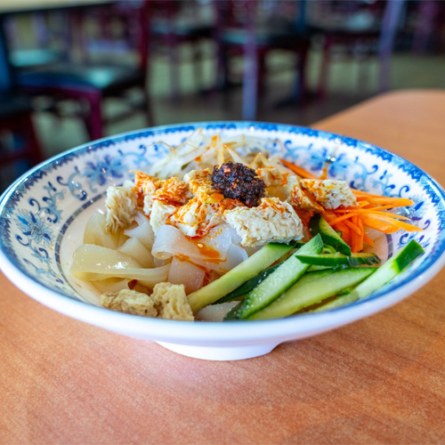 Asian food in a bowl on the table
