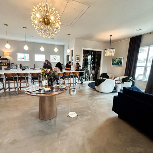 People sitting at table in a wine bar
