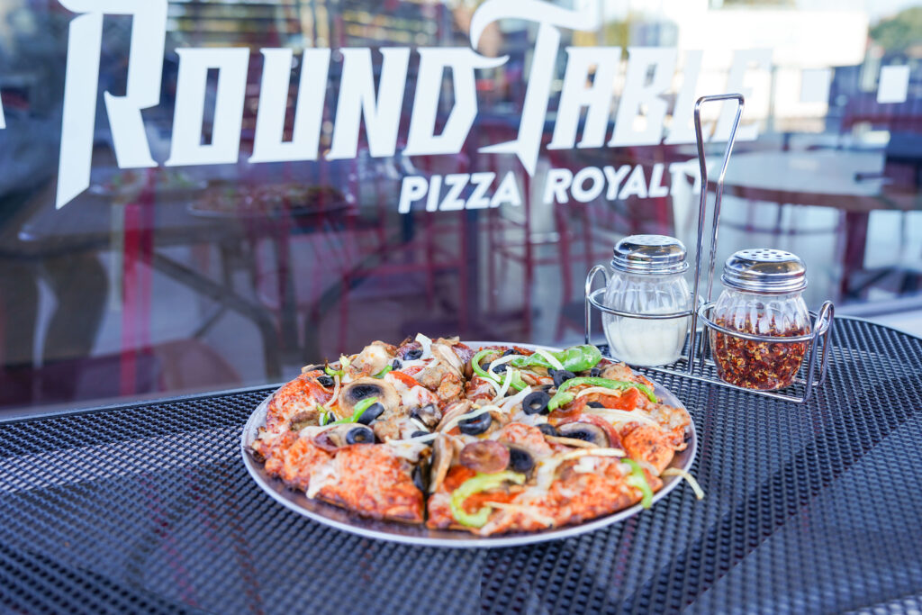Outdoor seating and Pizza