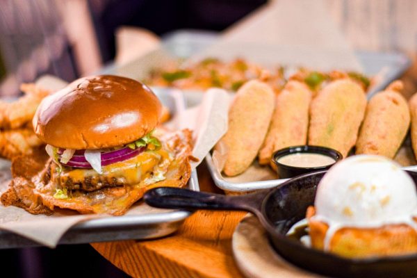 Cheeseburger, corn dogs, and a skillet cookie with ice cream at Rowdy Cowboy.